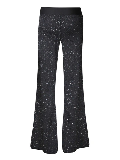Shop Palm Angels Black Flared Sequins Trousers