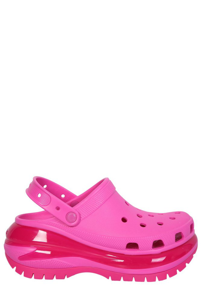 Shop Crocs Classic Mega Crush Clogs In Pink