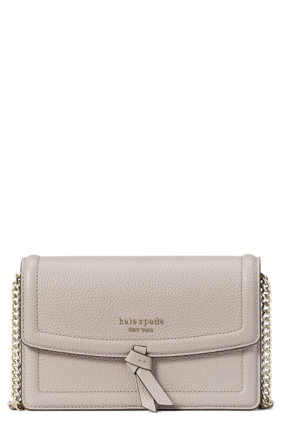 Shop Kate Spade Knott Pebbled Leather Flap Crossbody Bag In Warm Taupe.