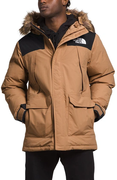 Shop The North Face Mcmurdo Waterproof 600 Fill Power Hooded Down Parka With Faux Fur Trim In Almond Butter/ Tnf Black