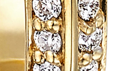 Shop Cast Demi Defiant Iced Diamond Hoop Earrings In 14k Yellow Gold