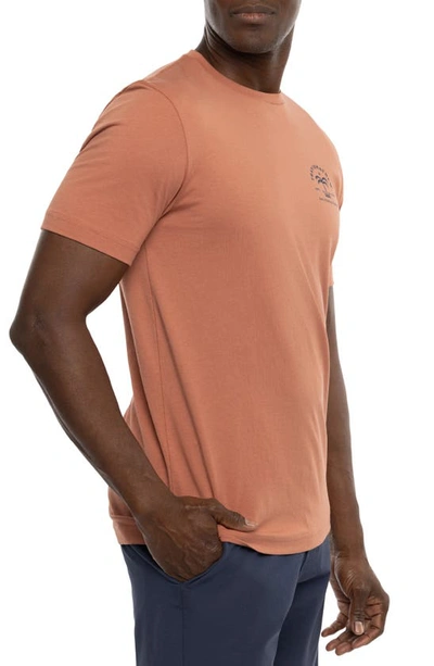 Travismathew Shock And Awe Cotton Graphic Tee In Copper