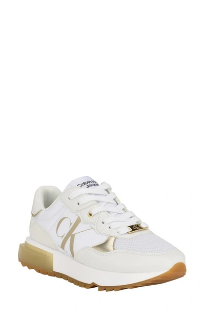 Shop Calvin Klein Magalee Sneaker In White/gold