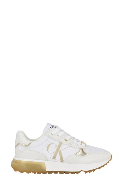 Shop Calvin Klein Magalee Sneaker In White/gold