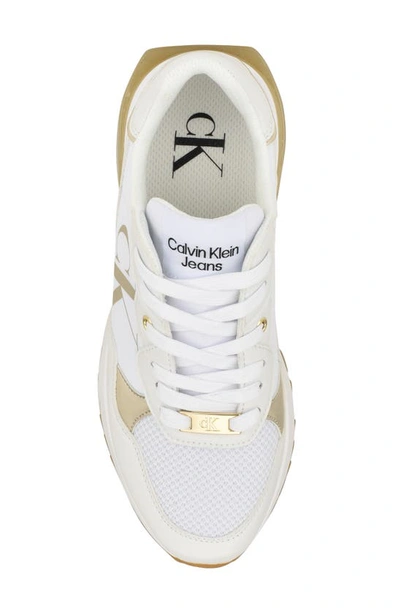 Shop Calvin Klein Magalee Sneaker In White/gold