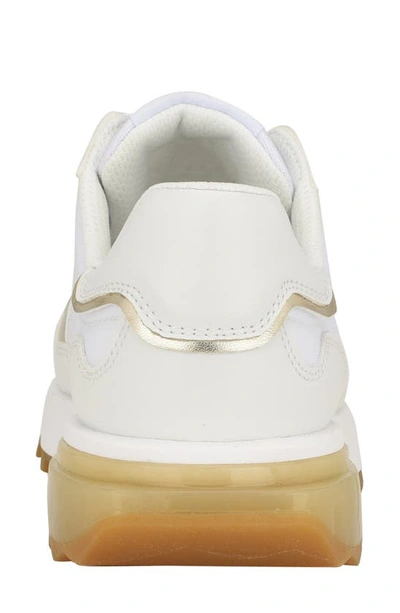 Shop Calvin Klein Magalee Sneaker In White/gold