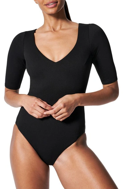 Shop Spanx Piqué Shaping Short Sleeve One-piece Rashguard Swimsuit In Very Black