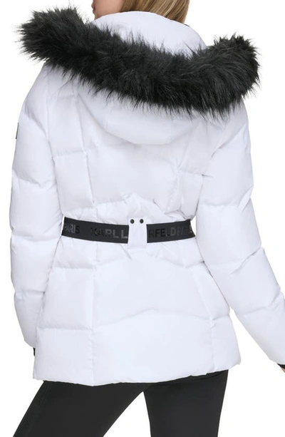 Shop Karl Lagerfeld Smocked Belted Ski Puffer Jacket With Faux Fur Hood In White
