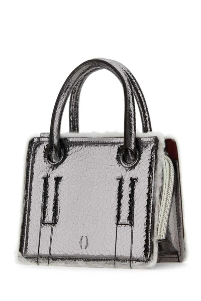 Shop Dentro Handbags. In Grey