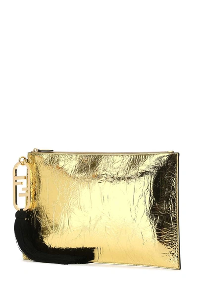 Shop Fendi Clutch In Gold