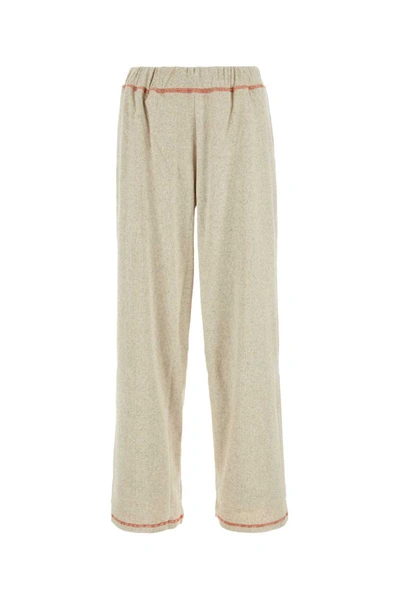 Shop Baserange Pants In Beige O Tan