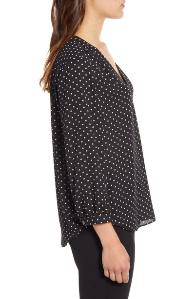 Shop Vince Camuto Polka Dot V-neck Top In Rich Black