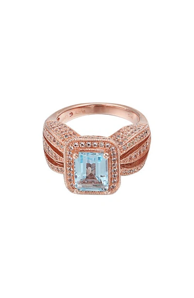 Suzy Levian Sterling Silver 5.25 Tcw Blue Topaz Ring In Rose Gold/ Blue