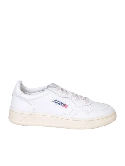 Shop Autry Sneakers In White