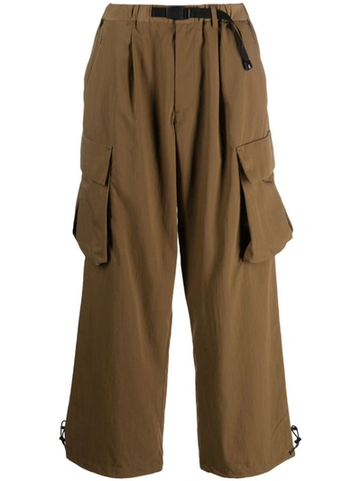 Shop Gramicci Nylon Cargo Trousers In Brown