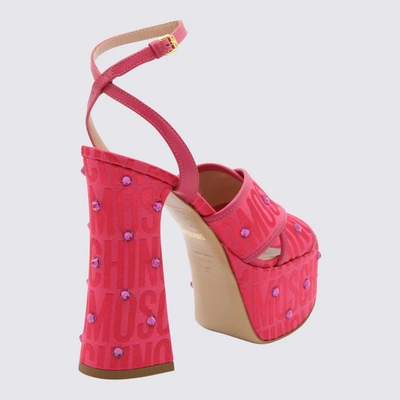 Shop Moschino Fuchsia Nylon And Leather Allover Monogram Jacquard Sandals In Red