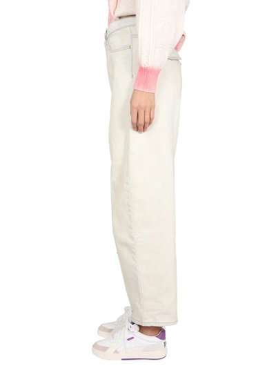 Shop Palm Angels Carrot Fit Jeans In White