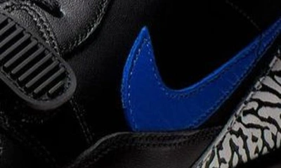 Shop Nike Air Jordan Legacy 312 Low Sneaker In Black/ Game Royal/ White