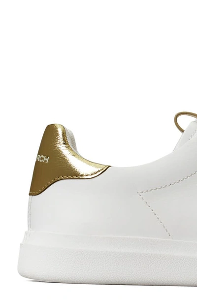 Shop Tory Burch Double T Howell Court Sneaker In White/ Spark Gold
