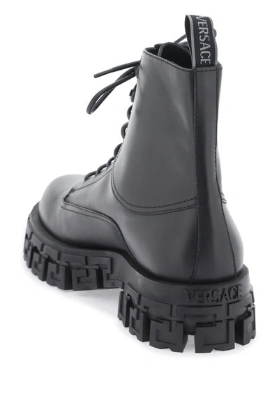 Shop Versace Greca Portico Combat Boots Men In Black