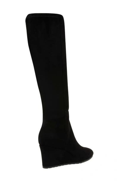 Shop Anne Klein Valonia Wedge Knee High Boot In Black Suede