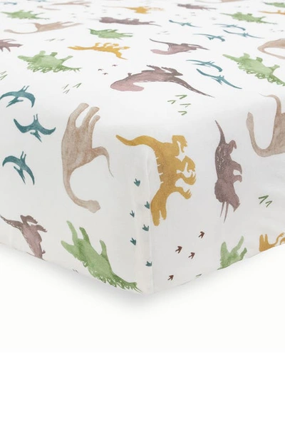 Shop Little Unicorn Knit Crib Sheet In Neutral Dino Friends