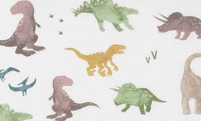 Shop Little Unicorn Knit Crib Sheet In Neutral Dino Friends