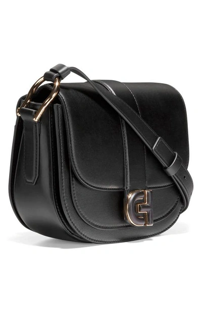 Shop Cole Haan Mini Essential Saddle Bag In Black