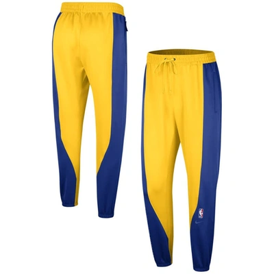 NIKE NIKE ROYAL/GOLD GOLDEN STATE WARRIORS 2023/24 AUTHENTIC SHOWTIME PANTS 