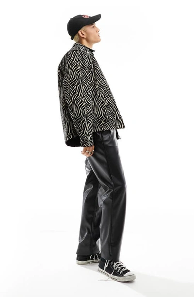 Shop Asos Design Reversible Zebra Jacquard Jacket In Black