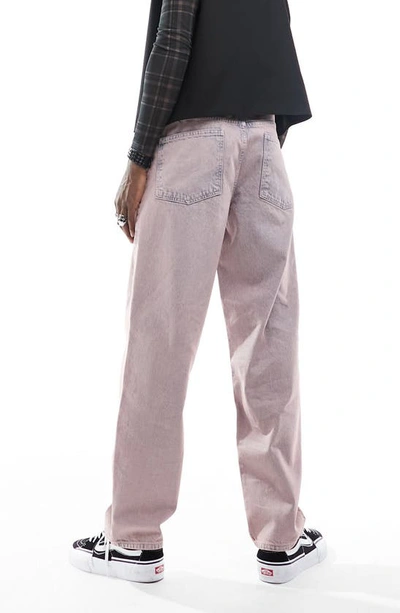 Shop Asos Design Distressed Baggy Jeans In Pink
