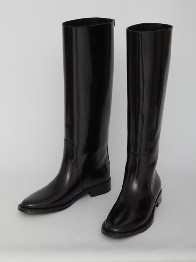 Shop Saint Laurent Hunt Boots In Glazed Leather In Black