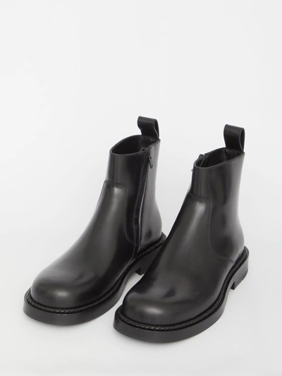 Shop Bottega Veneta Strut Ankle Boots In Black