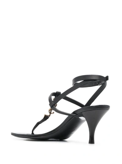 Shop Saint Laurent Thong Strap Cassandra Sandals In Black