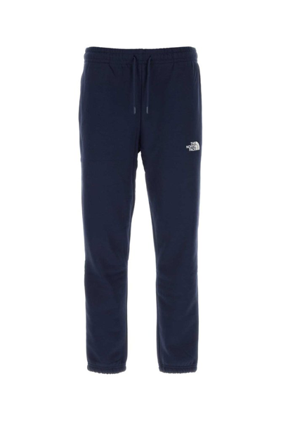 Shop The North Face A Essentials Logo Embroidered Sweatpants In Blue