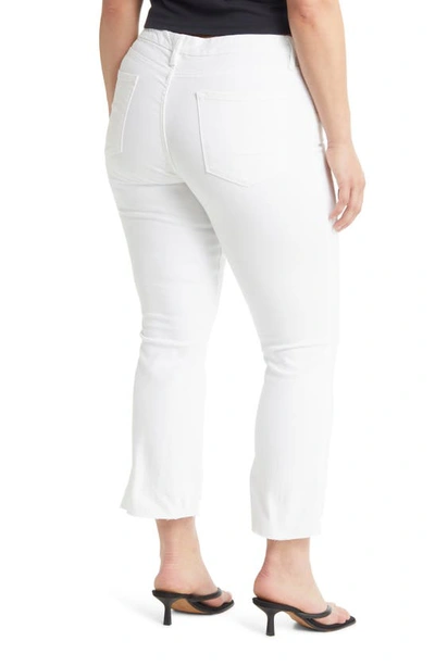 Shop Frame Le Crop Mini Boot Stagger Raw Hem Crop Bootcut Jeans In Blanc