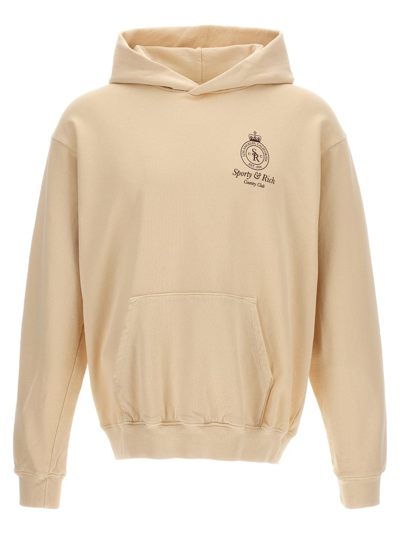Shop Sporty And Rich Sporty & Rich Logo Printed Long Sleeved Hoodie In Beige