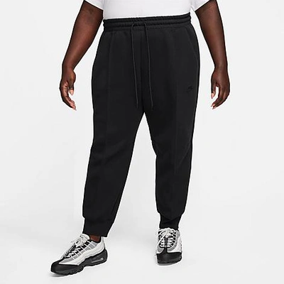Shop Nike Women's Sportswear Tech Fleece Mid-rise Jogger Pants (plus Size) In Black/black