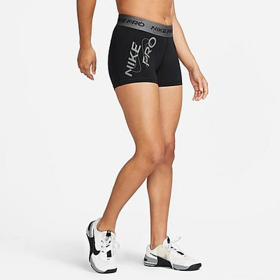 Shop Nike Women's Pro Dri-fit Mid-rise 3 Inch Graphic Shorts In Black/iron Grey