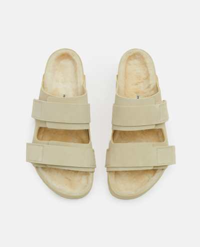 Shop Birkenstock Uji Suede And Leather Slippers In Yellow