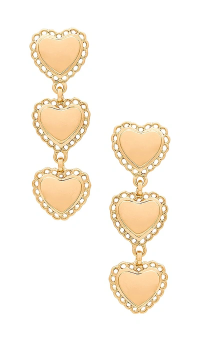 Shop Petit Moments Trio Heart Earrings In Metallic Gold