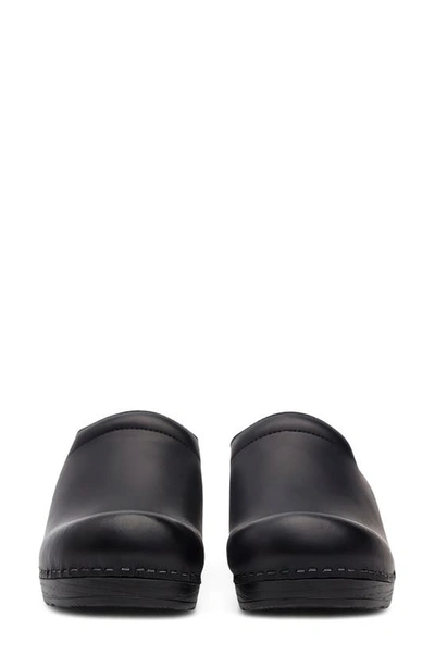 Shop Dansko 'sonja' Oiled Leather Clog In Black Cabrio