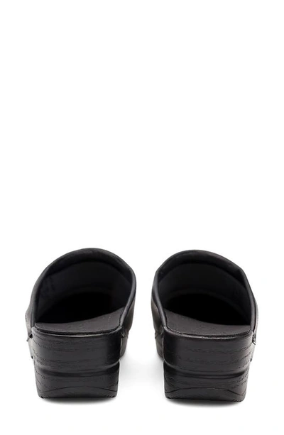 Shop Dansko 'sonja' Oiled Leather Clog In Black Cabrio