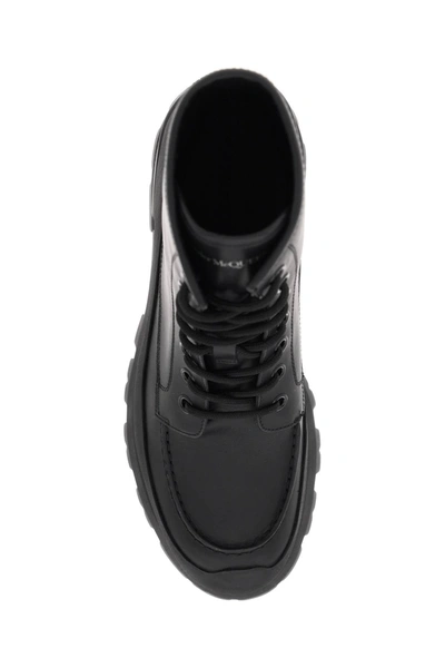 Shop Alexander Mcqueen Leather Ankle Boots Men In Black