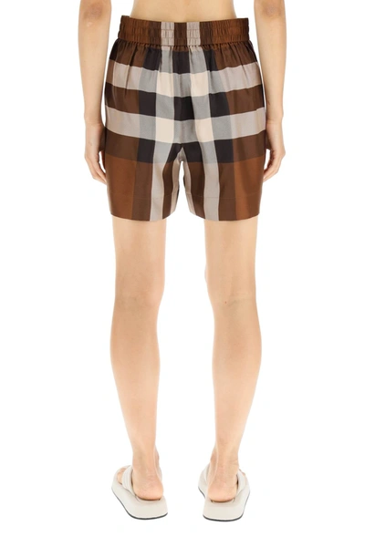 Shop Burberry Exploded Check Silk Shorts Women In Brown