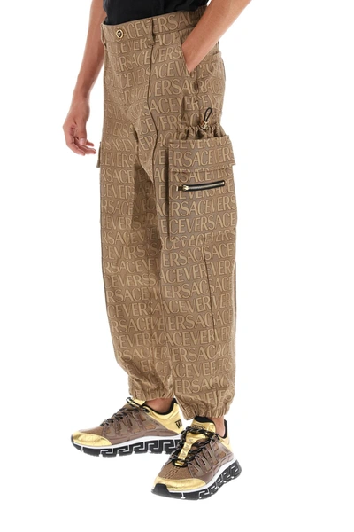 Shop Versace Allover Cargo Pants Men In Brown