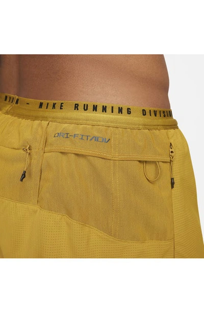 Shop Nike Run Division Dri-fit Adv Shorts In Bronzine