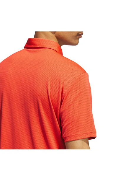 Shop Adidas Golf Core Colorblock Golf Polo In Bright Red