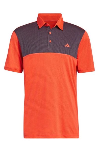 Shop Adidas Golf Core Colorblock Golf Polo In Bright Red