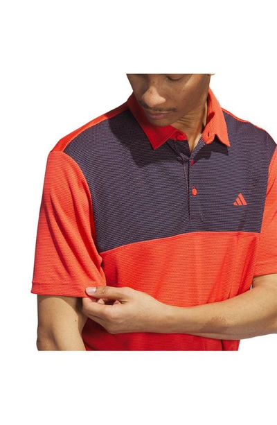 Shop Adidas Golf Core Colorblock Golf Polo In Bright Red